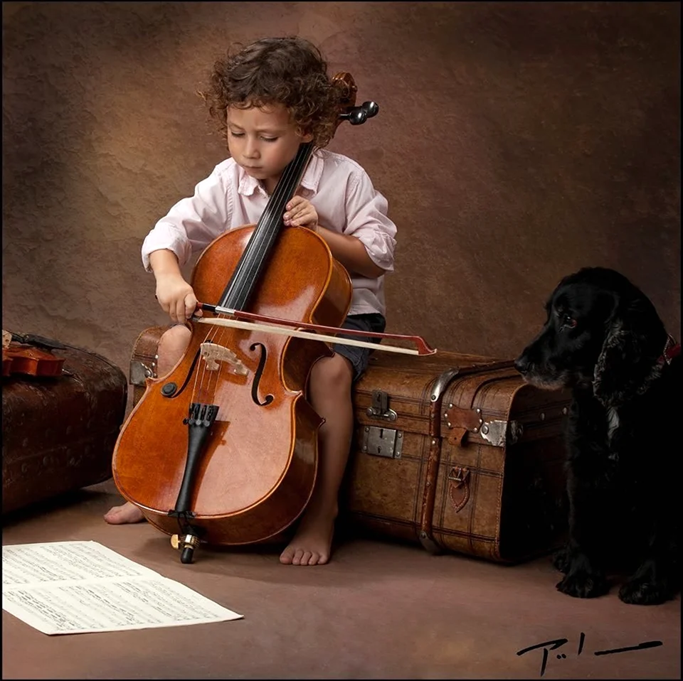 Мальчик с виолончелью. Картинка