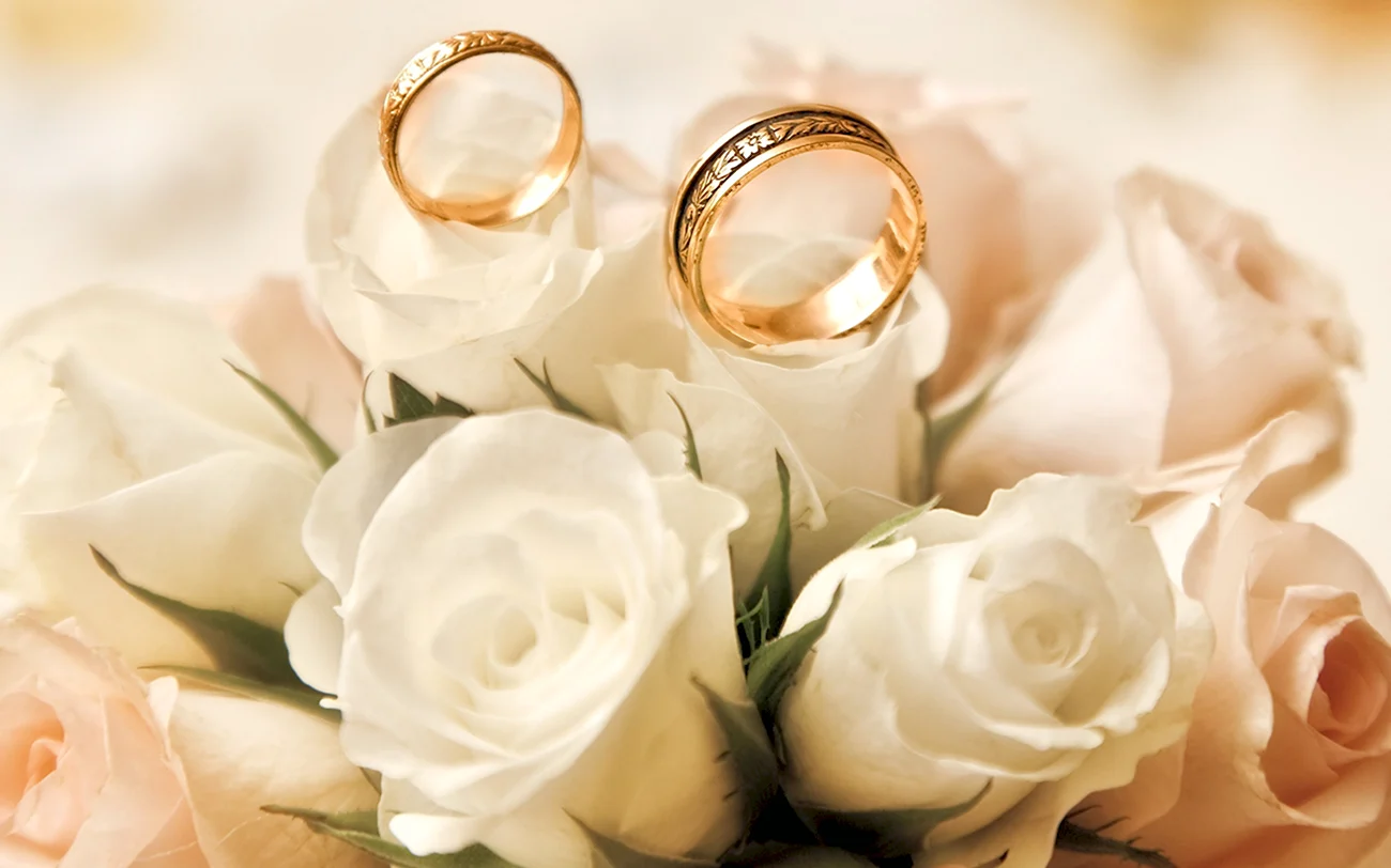 Свадебный букет с обручальными кольцами. Красивая картинка